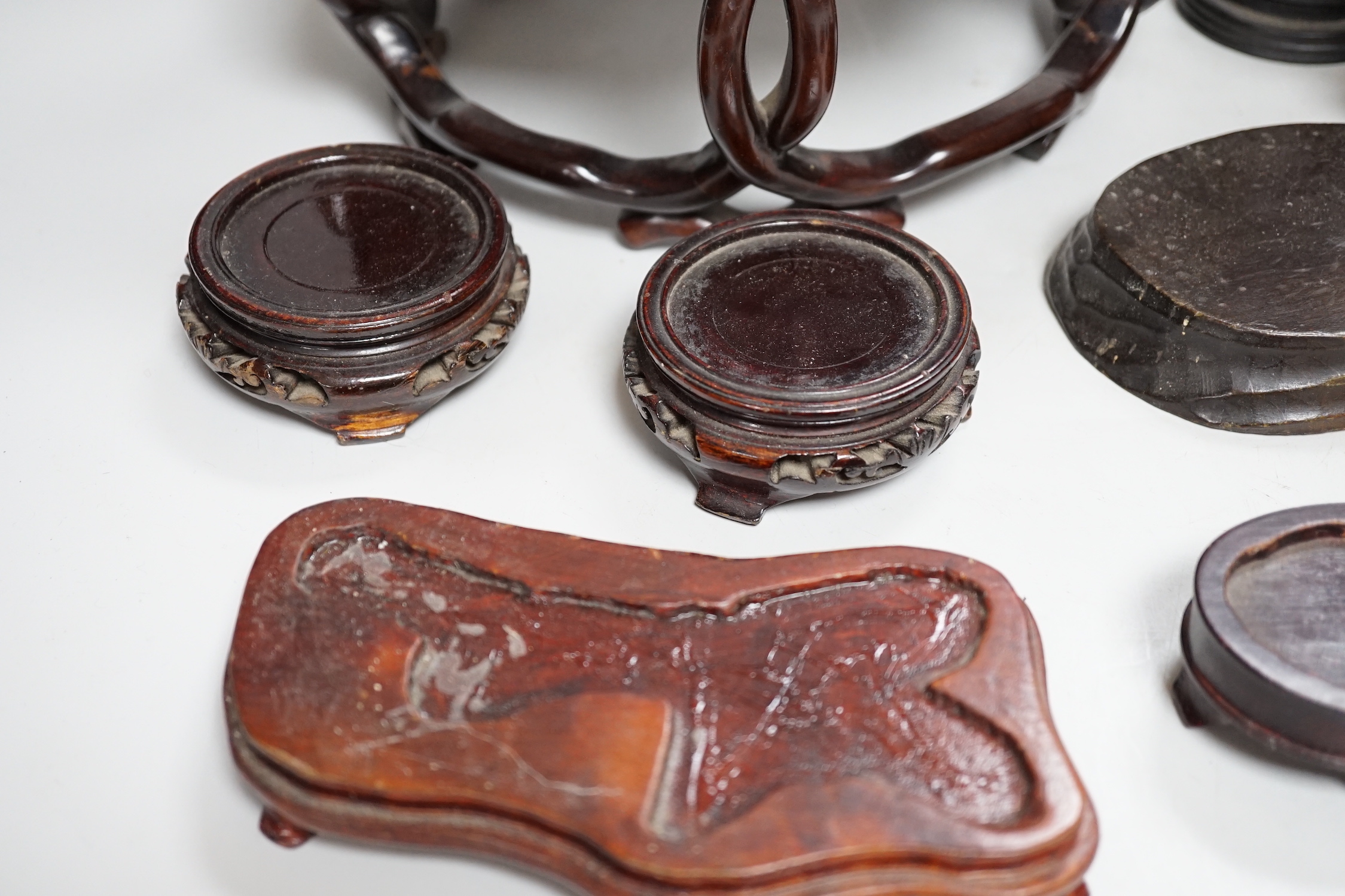 A group of Chinese wood stands and a perfume holder